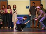  Jake Knight plays Ren McCormack, left, and Connor Treece plays Willard during Perrysburg High School's presentation of 'Footloose.'