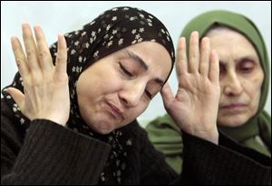 Now known as the angry and grieving mother of the Boston Marathon bombing suspects, Zubeidat Tsarnaeva is drawing increased attention after federal officials say Russian authorities intercepted her phone calls, including one in which she vaguely discussed jihad with her elder son. In another, she was recorded talking to someone in southern Russia who is under FBI investigation in an unrelated case, U.S. officials said.