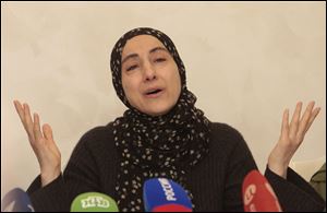 The mother of the two Boston bombing suspects, Zubeidat Tsarnaeva, speaks at a news conference in Makhachkala, the southern Russian province of Dagestan, Thursday.