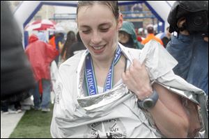 Laura Gillette of Goshen, Ind., won the women's marathon in a time of 3 hours, 3 minutes, 34 seconds.