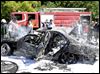  Firefighters in Syria extinguish a fire after a car bomb exploded, targeting Prime Minister Wael al-Halqi this week.