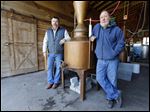  Darrin Critchet, left, registered agent and investor, with permit owner Ernest Scarano at Ernest Scarano Distillery in Fremont.