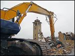  The demolition of St. Ignatius Catholic Church in Oregon, which dated to 1927, is near completion. The parish plans to open its new 11,931-square-foot church by March. The project cost is $3 million.