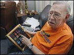  Korean War vet Bill Williams, with medals he received for wartime service, also recalls growing up during World War II, when he lived near the POW camp at the Rossford Ordnance Depot.  