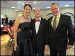  At the Lourdes' Luminations event were, from left, Susan and Allan Block and Broadway’s Tim Shew.