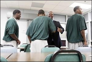 Willie Knighten, once the undisputed leader of the Southside Folk, greets inmates in the Lucas County Correctional Treatment Facility. Every Wednesday, Knighten visits the facility  to help felons live better, more productive lives upon release. He says much of the gang problem would be solved if fathers were active in their children’s lives. 