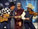  George Jones’ (center) vast catalog — he famously scored chart hits in five different decades — provided plenty of entry points for young fans to discover him without the baggage of country-music trend cycles.