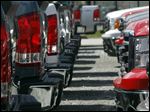  In this Thursday, April 25, 2013, photo, GMC trucks are lined up on the lot of Capitol City Buick Pontiac GMC in Montpelier, Vt. The auto industry is expected to post its best April sales totals since 2007 when major automakers report monthly tallies Wednesday, May 1, 2013. (AP Photo/Toby Talbot)