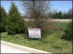  Property proposed for 18-unit housing development, on Heidaway Lane.