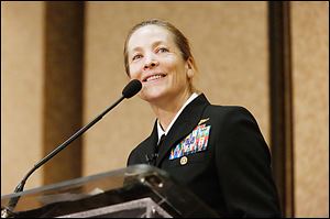 Navy Capt. Shoshana Chatfield tells a University of Toledo audience that women can advance themselves as leaders, regardless of their field.