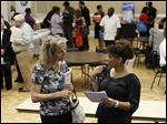  New report shows 324,000 Americans filing first-time unemployment claims last week, as some at this Chattanooga, Tenn. look for work.