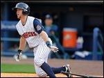  The Mud Hens' Bryan Holaday hits a double to drive in a run against the Charlotte Knights in the second inning at Fifth Third Field. Holaday had three hits.