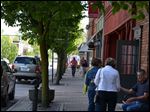  Shoppers walk along Main Street at Sylvania's 
