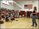  Rachael Scdoris, a legally blind professional sled dog racer from Bend, Ore., speaks to 6th grade students at McCord Junior High.