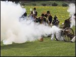  Re-enactors fire cannons to mark the First Siege of Fort Meigs that occurred on May 1, 1813. The celebration that concludes today is anchored at Fort Meigs but activities go on across the river. 