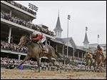  Joel Rosario rides Orb to victory during the 139th Kentucky Derby at Churchill Downs.
