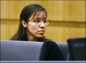 Defendant Jodi Arias looks to her family during closing arguments during her trial.