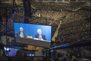 Tens of thousands attend Berkshire Hathaway shareholder meeting to hear Warren Buffett and Charlie Munger answer questions for more than six hours. No other annual meeting can rival Berkshire's, which is known for its size, the straight talk Buffett and Munger offer and the sales records shareholders set while buying Berkshire products.