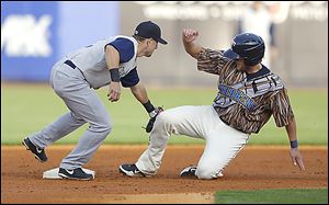 Toledo's Jordan Lennerton is caught trying to steal second by Charlotte's Steve Tolleson in the second inning at Fifth Third Field. The Mud Hens wore uniforms inspired by ‘Star Wars.’