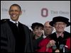  President Obama and Ohio State University President E. Gordon Gee arrive at the university’s spring commencement in Ohio Stadium last month.
