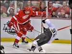  Detroit's Justin Abdelkader checks Anaheim's Toni Lydman during the second period of Game 3. The league ruled the hit deserved a two-game suspension. The Wings are down 2-1 in the series.