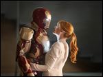  Gwyneth Paltrow as Pepper Potts with Iron Man in a scene from 