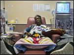  Martina Rutherford receives dialysis treatment in March at Fresenius Medical Care in Peoria, Ill., a four-hour process that she must endure three times a week. Rutherford donated a kidney to her sister, Dorothy Davis, back in 1985 and now needs on herself. Dorothy was Peoria's first kidney transplant.