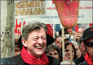 Jean Luc Melenchon, French leftist party chief, beams as protesters rally against the austerity measures announced by the French government, viewed as a broken campaign promise by President Francois Hollande.