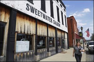 The Sweetwater Saloon dominates main street, taking up most of the block in Golconda, Ill. John Towns, owner of the Sweetwater Saloon says oil drilling would not bother him a bit.