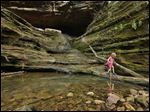  Lucy Childers, 6, plays on the rock formations at Ferne Clyffe State Park in Goreville, Ill. Southern Illinoisans have hopes and fears surrounding the high-volume oil and gas drilling that may be starting in the Shawnee National Forest. Many people are beginning to brace for change as state lawmakers consider regulations that would allow energy companies to begin drilling deep in the southern Illinois bedrock for oil and natural gas, using a process known as high-volume hydraulic fracturing, or “fracking,” that has transformed the landscape in places like North Dakota and Pennsylvania.