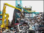  Trademark Metals Recycling yard in south Orlando, Florida has a machine that can pulverize an entire car in seven seconds.
