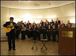  Professor and self-taught guitarist Miguel Saucedo played Mexican folk songs.