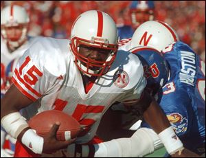 In this 1995, file photo, Nebraska quarterback Tommie Frazier runs to inside the one-yard line during of a game in Lawrence, Kan. Frazier was selected today to the College Football Hall of Fame.