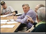  Ken Katafias, operations manager of Sylvania Recreation Corporation, center, listens as veterans this week discuss this year's Memorial Day in Sylvania. 