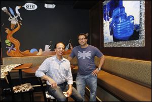 Co-owners Joe Skaff, left, and Moussa Salloukh, who have been friends for more than 20 years, say they are ready for today’s opening of their new Burger Bar 419 Monroe St. 