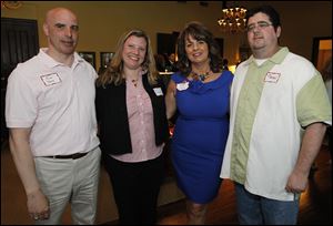 Veterans Rich Dale, Jenn Bauer, Pam Hays and Brian Jones attend the Dancing for the Military Stars preview party at the Inverness Club.
