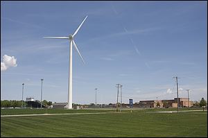 Archbold School District’s wind turbine, next to the high school football field, was dedicated Wednesday afternoon with a ceremony and ribbon cutting.