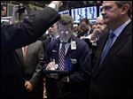 In this Thursday, May 2, 2013, photo, ING U.S. Chairman and CEO Rodney Martin, Jr., right, watches as Getco specialist Peter Giacchi calls out prices during the IPO of Martin's company, on the floor of the New York Stock Exchange. World stock markets were mostly lower Thursday May 9, 2013 as investors weighed an interest rate cut in South Korea against rising inflation in China. (AP Photo/Richard Drew)