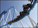  Fans ride the new GateKeeper roller coaster during Media Day at  Cedar Point.