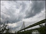  ROV clouds10p  Storm clouds roll over the the Veterans' Glass City Skyway bridge, Thursday,  May 9, 2013. The Blade/Andy Morrison