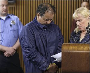 Ariel Castro appears in Cleveland Municipal Court with defense attorney Kathleen DeMetz. Castro was charged with four counts of kidnapping and three counts of rape against three women missing for about a decade.