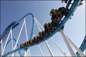Fans ride the new GateKeeper roller coaster during Media Day at  Cedar Point.