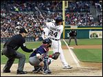  The Tigers' Miguel Cabrera (24) connects for a three-run home run off Indians starting pitcher Corey Kluber during the fourth inning.