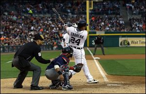 Detroit Tigers' Miguel Cabrera connects for a three-run home run off Cleveland Indians starting pitcher Corey Kluber during the fourth inning today in Detroit.