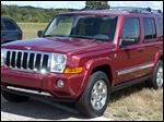  The 2006 Jeep Commander sits on display at Chelsea Proving Grounds in Chelsea, Mich. Chrysler is recalling 469,000 Jeep SUVs worldwide because they can shift into neutral without warning.