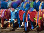 Finished toy animals made from pieces of discarded flip-flops are laid out in rows to dry in the sun, having just been washed, at the Ocean Sole flip-flop recycling company in Nairobi, Kenya.