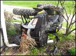  An all-terrain vehicle lies on its side following a crash in Wood County. There were 279 ATV-related deaths reported in the state of Ohio between 1982 and 2007. Eighty of those deaths involved children under the age of 16.
