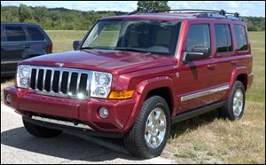 The 2006 Jeep Commander sits on display at Chelsea Proving Grounds in Chelsea, Mich. Chrysler is recalling 469,000 Jeep SUVs worldwide because they can shift into neutral without warning.