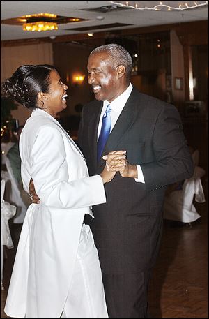 Ohio State University Athletic Director Gene Smith shares a dance with his daughter, Lindsay Smith, in 2007. Smith describes himself as an accepting person, whether it involves the sexual orientation of athletes at OSU or his daughter, who informed her parents while in college that she was a lesbian.