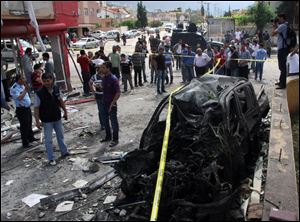 The site of one of explosions after several explosions killed at least 40 people and injured dozens in Reyhanli, near Turkey's border with Syria.
